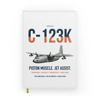 Thumbnail for C-123K Provider design on white notebook