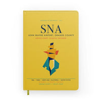 Thumbnail for John Wayne Airport, Orange County (SNA) design on yellow notebook