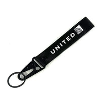 Thumbnail for United Airlines Hawk-shaped key chain, Black + NO NAME