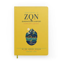 Thumbnail for Queenstown Airport (ZQN) design on yellow notebook
