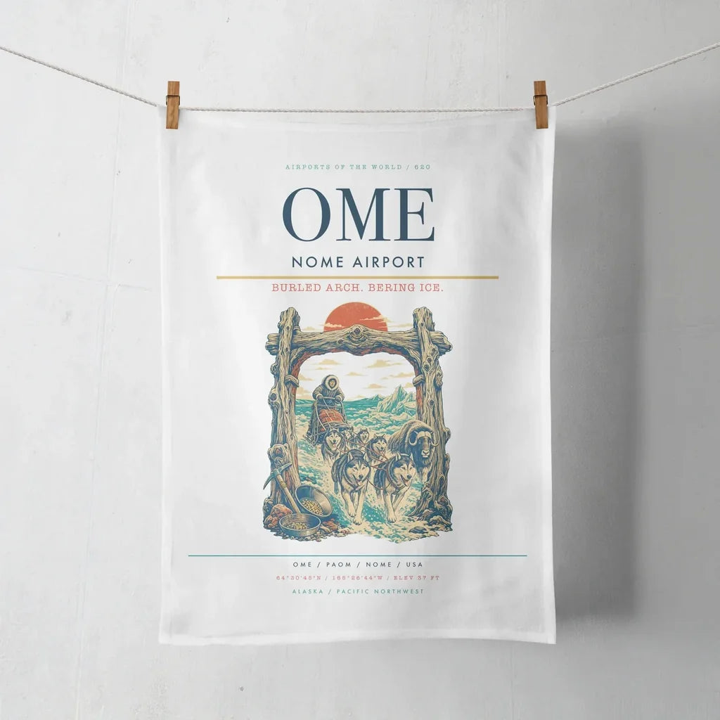 Nome Airport (OME) design on white towel
