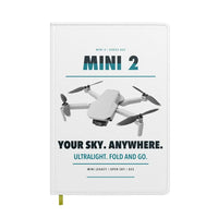 Thumbnail for DJI Mini 2 design on white notebook