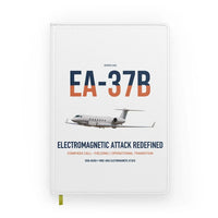 Thumbnail for EA-37B Compass Call design on white notebook
