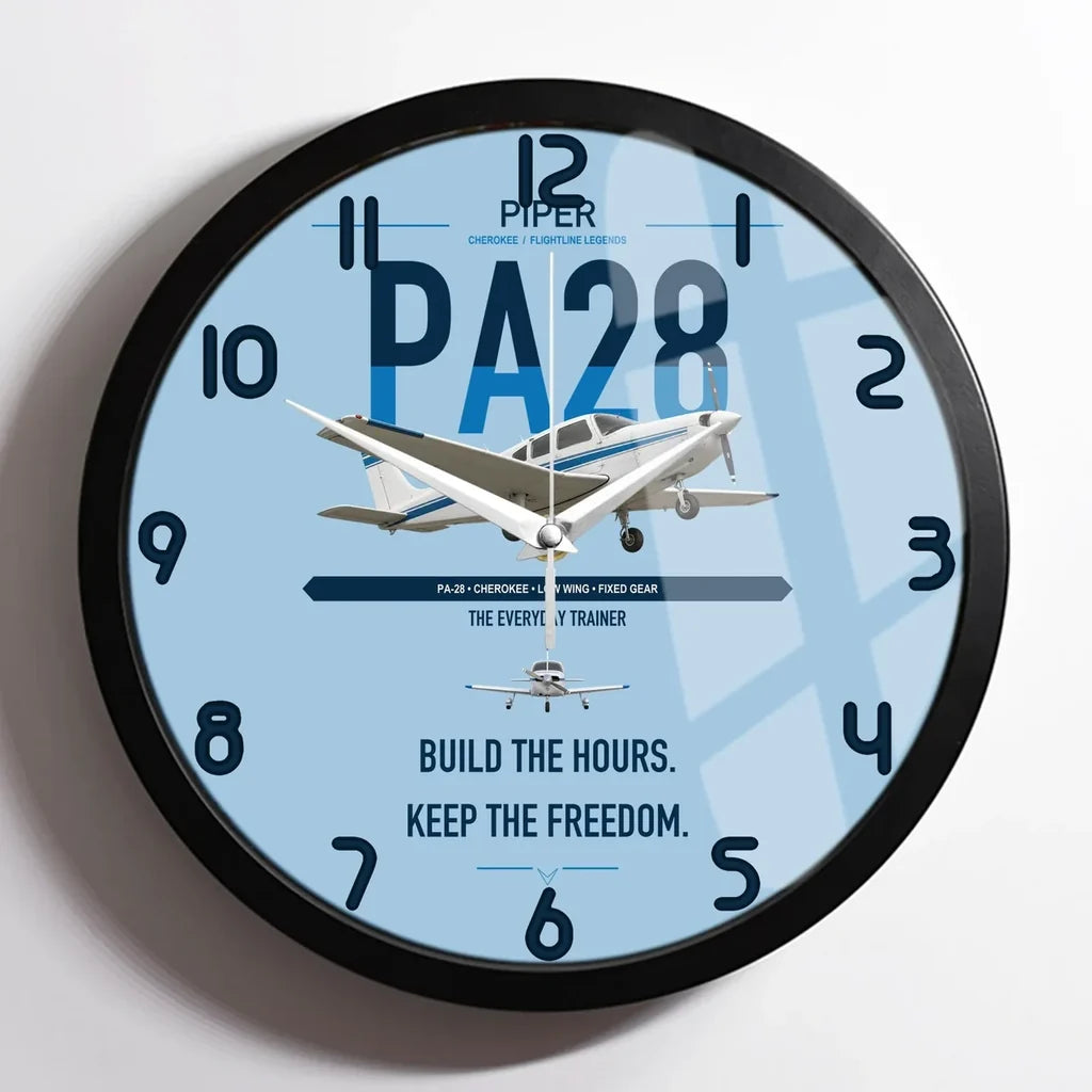 Piper PA-28 Cherokee design on light blue framed wall clock