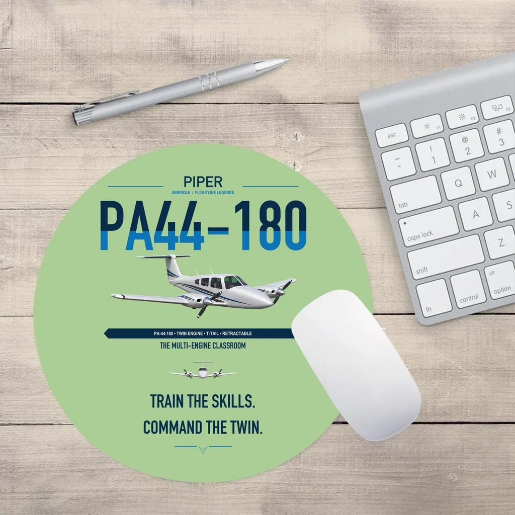Piper PA-44-180 Seminole design on light green round mouse pad