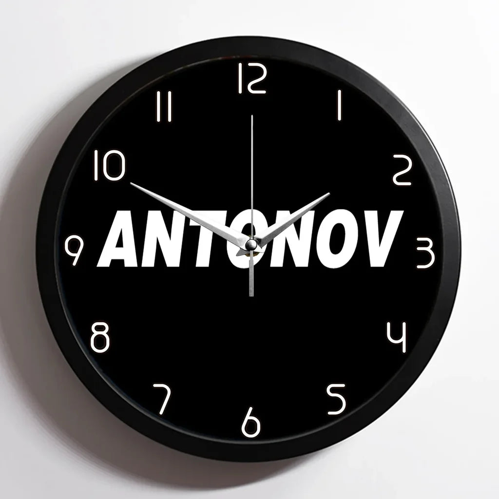 Antonov & Text aviation design on premium wood and metal wall clock.