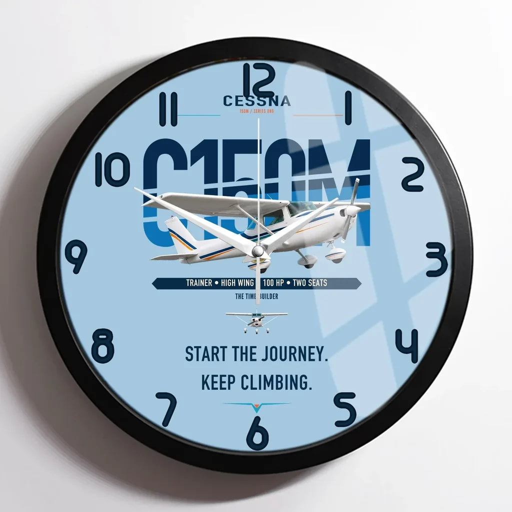 Cessna 150M design on light blue framed wall clock