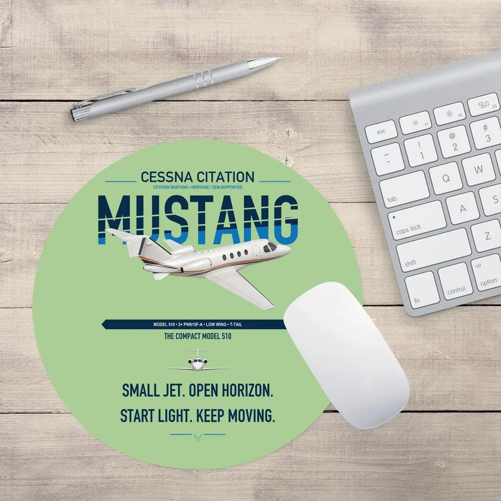 Cessna Citation Mustang design on light green round mouse pad