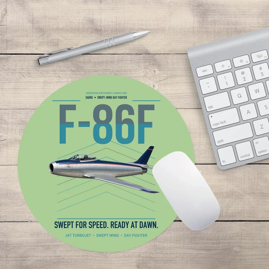 F-86F Sabre design on light green round mouse pad