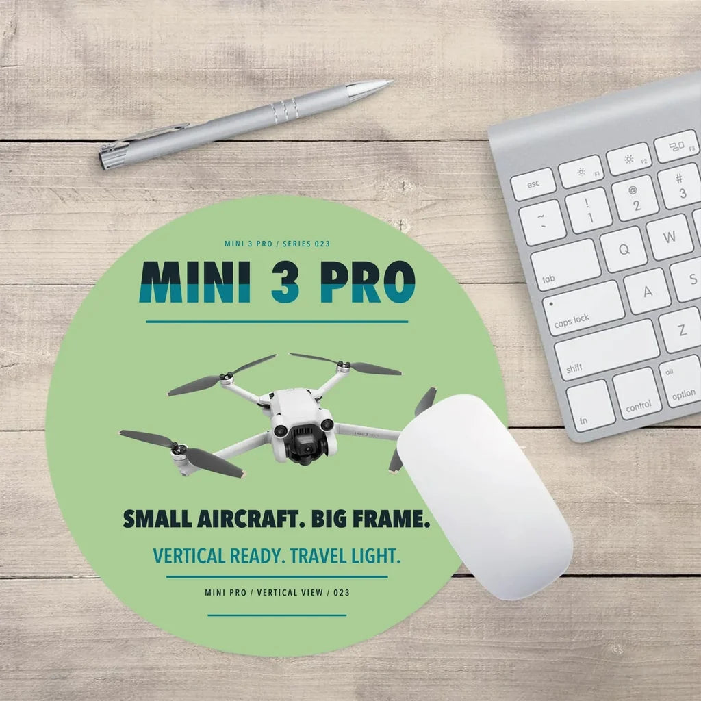 DJI Mini 3 Pro design on light green round mouse pad