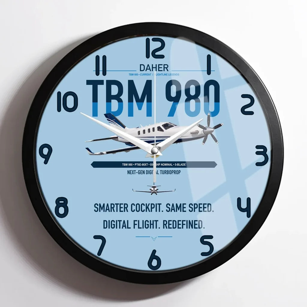 Daher TBM 980 design on light blue framed wall clock