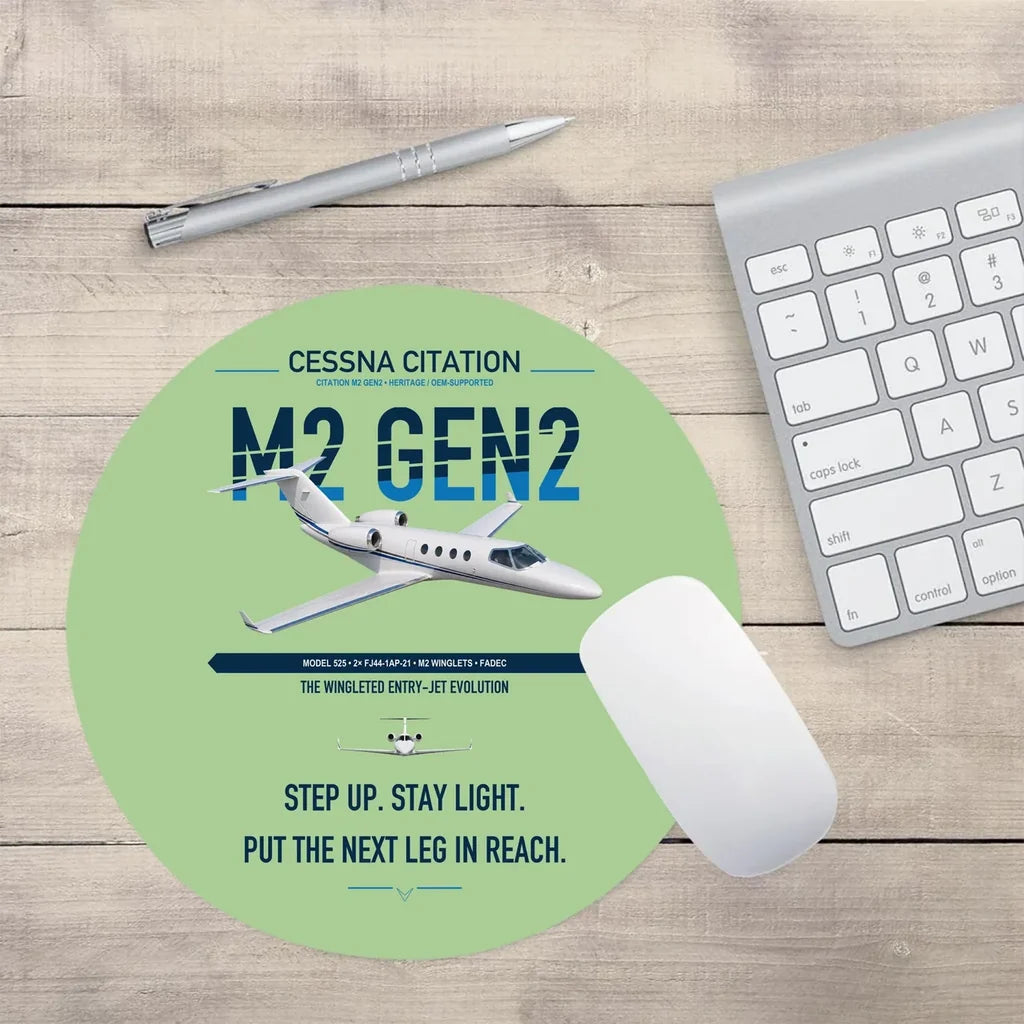 Cessna Citation M2 Gen2 design on light green round mouse pad