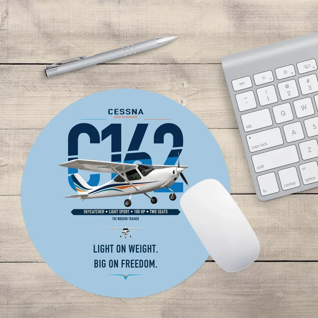 Cessna 162 Skycatcher design on light blue round mouse pad