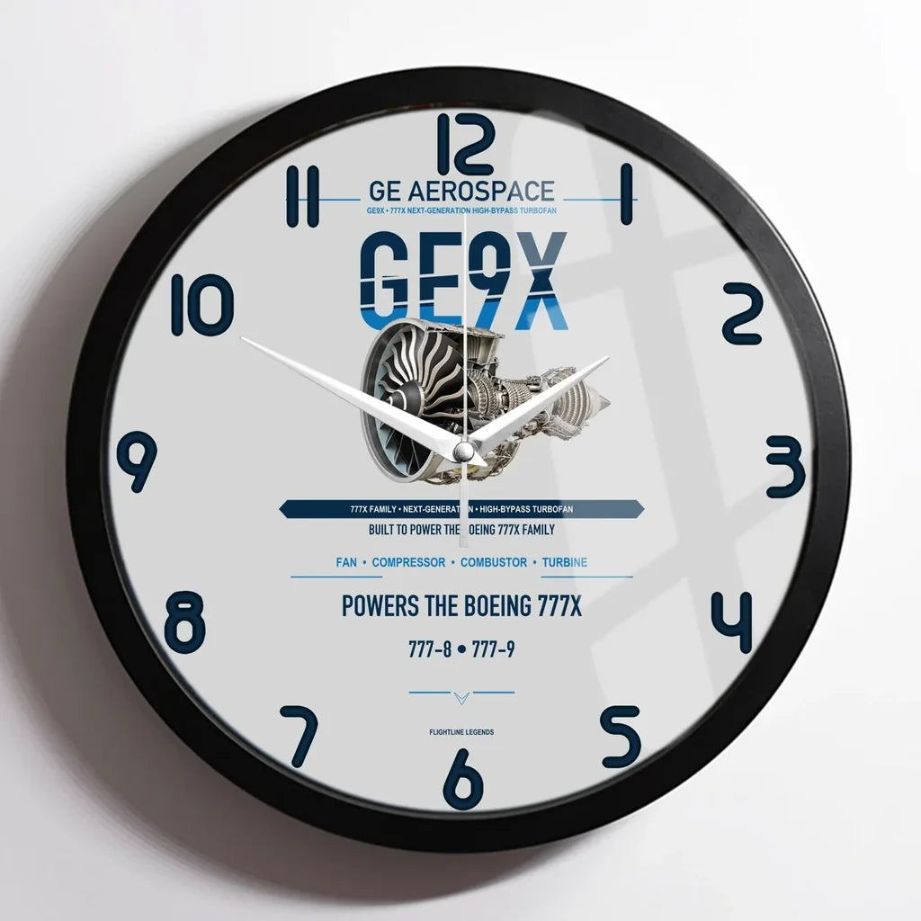 GE9X design on light gray framed wall clock