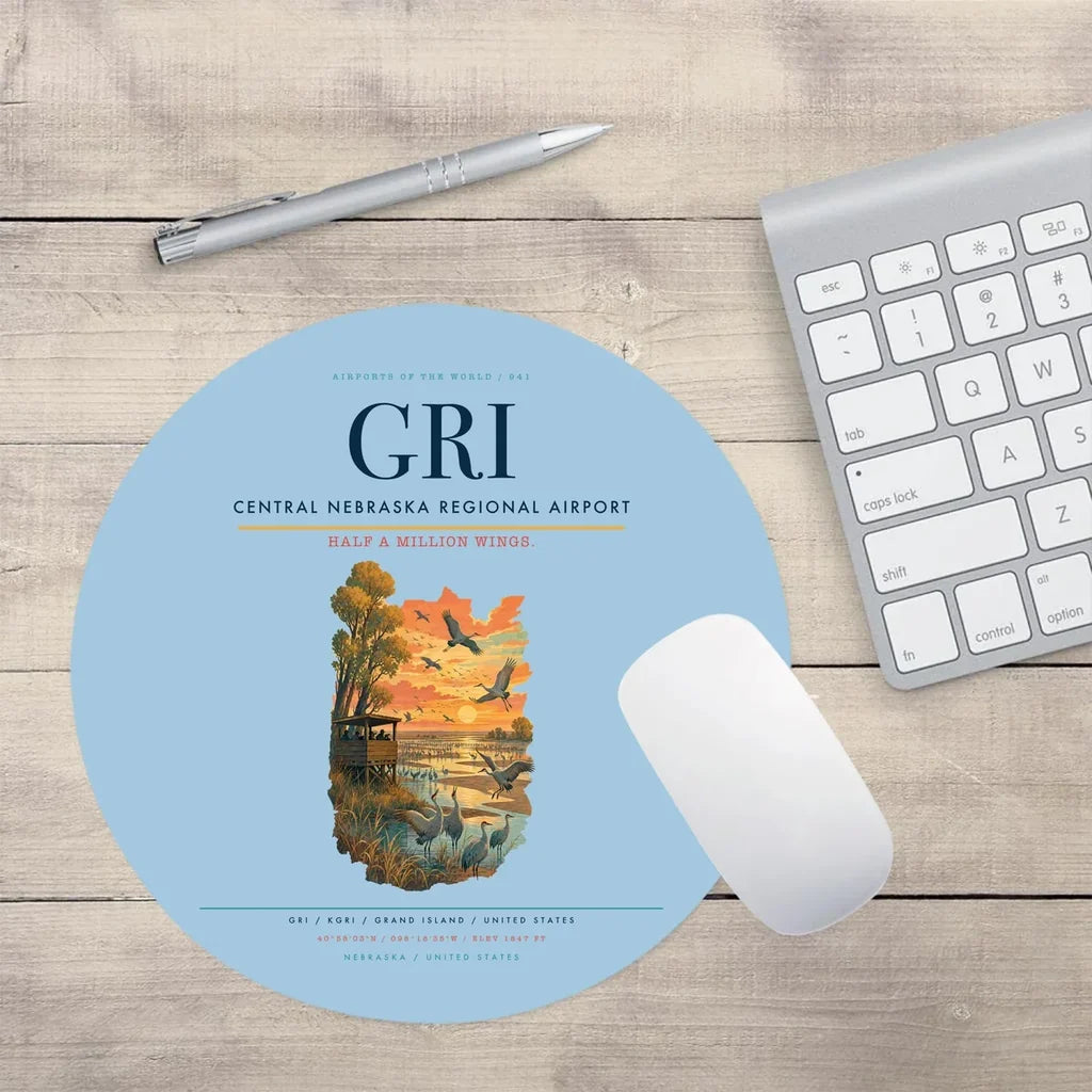 Central Nebraska Regional Airport (GRI) design on light blue round mouse pad