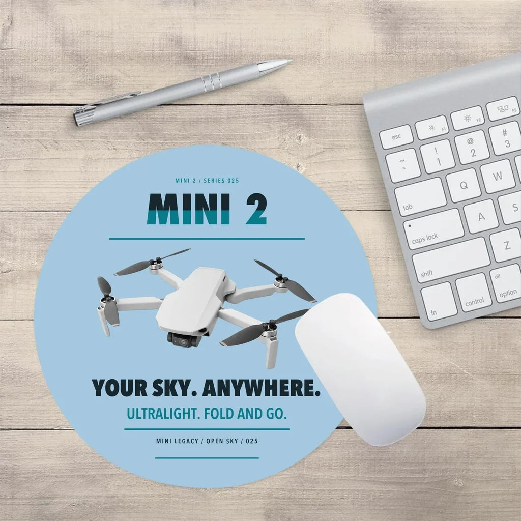 DJI Mini 2 design on light blue round mouse pad