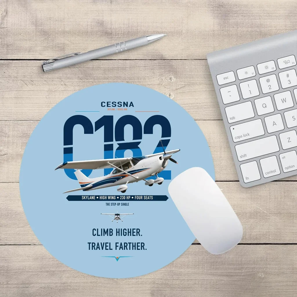 Cessna 182 Skylane design on light blue round mouse pad