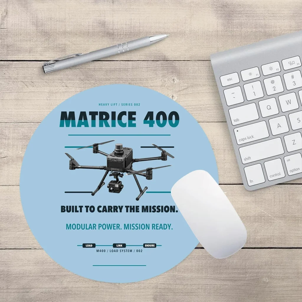 DJI Matrice 400 design on light blue round mouse pad