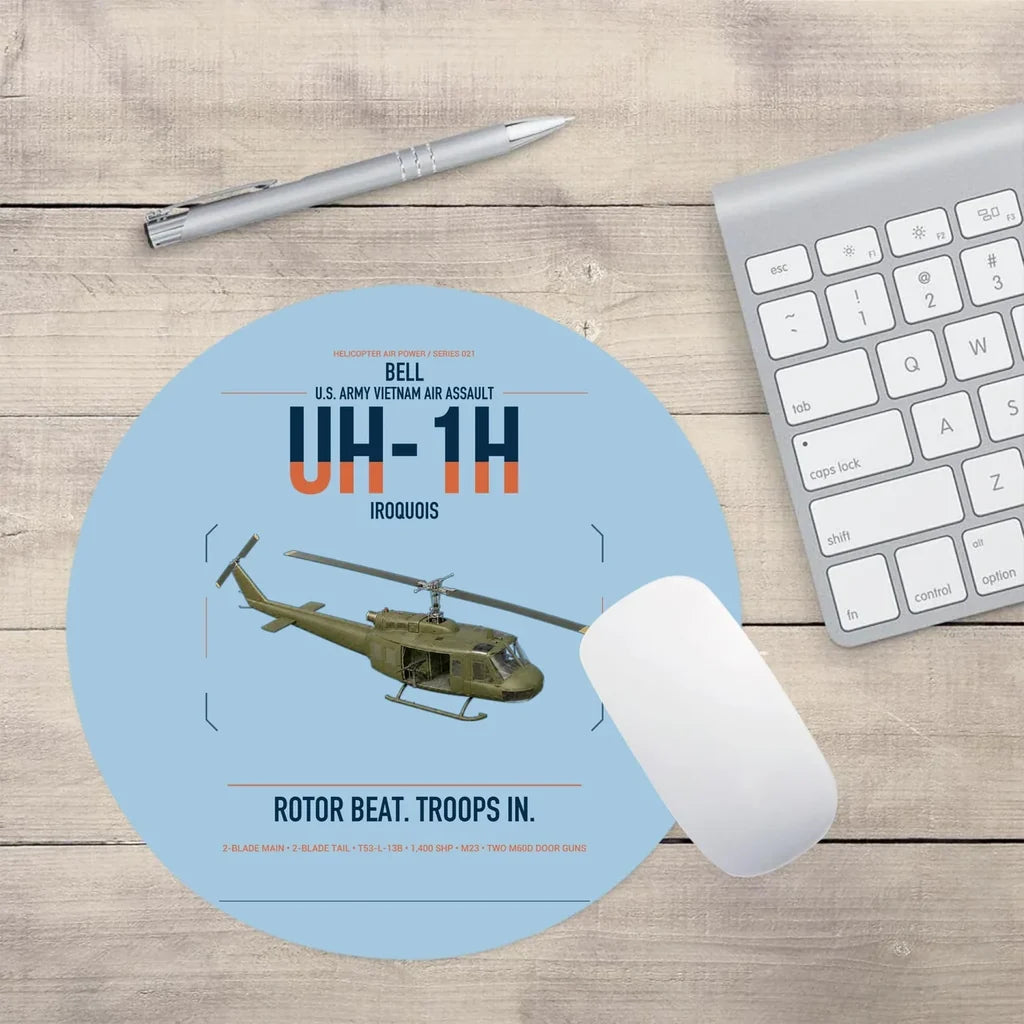 Bell UH-1H Iroquois design on light blue round mouse pad