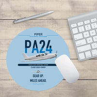 Thumbnail for Piper PA-24-250 Comanche 250 design on light blue round mouse pad