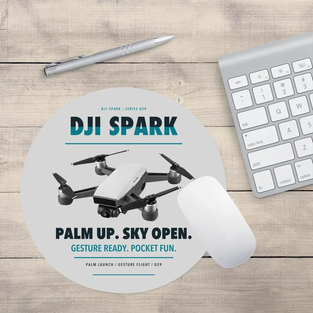 DJI Spark design on light gray round mouse pad