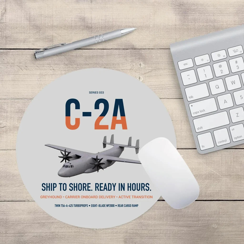 C-2A Greyhound design on light gray round mouse pad
