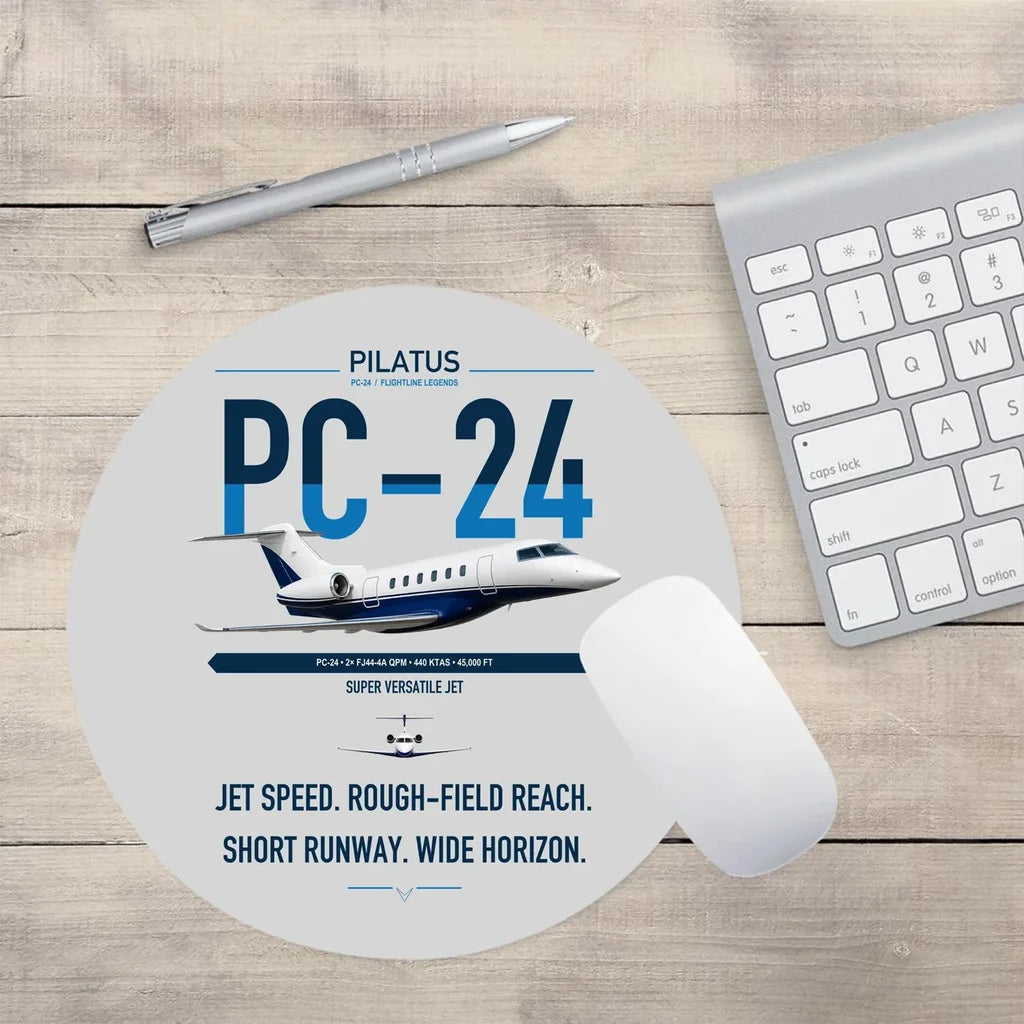 Pilatus PC-24 design on light gray round mouse pad