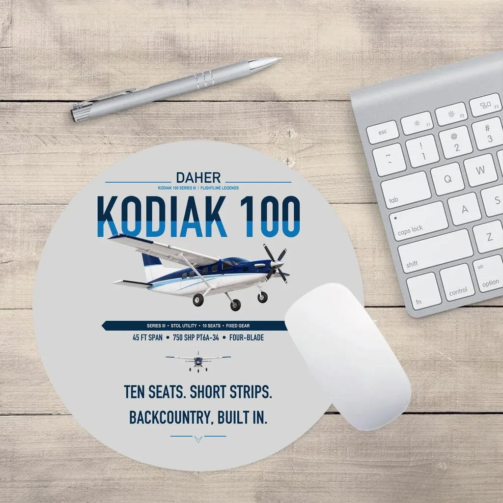 Daher Kodiak 100 Series III design on light gray round mouse pad