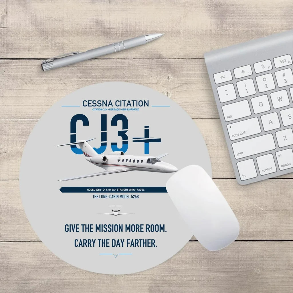 Cessna Citation CJ3+ design on light gray round mouse pad