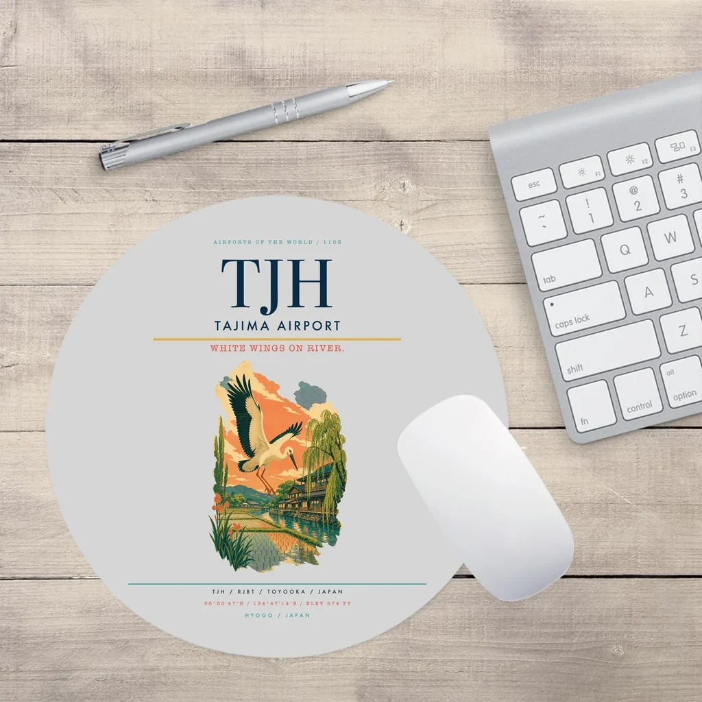 Tajima Airport (TJH) design on light gray round mouse pad