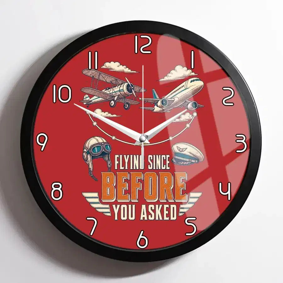 Flying Since Before You Asked design on red framed wall clock