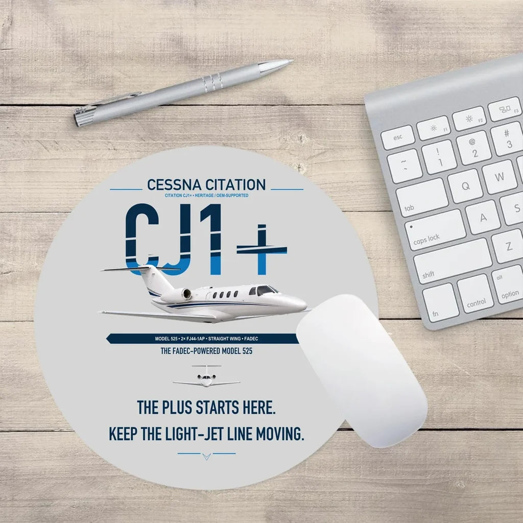 Cessna Citation CJ1+ design on light gray round mouse pad