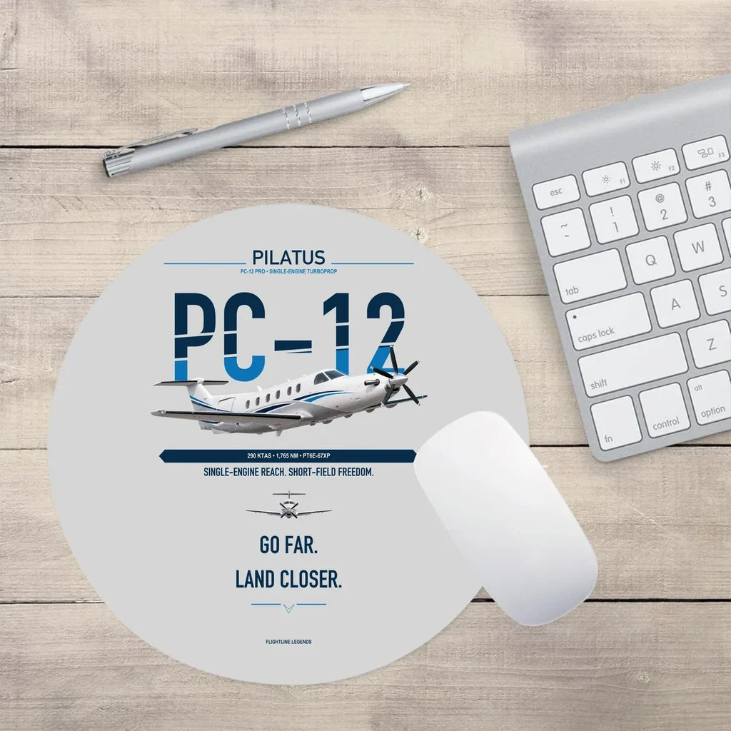 Pilatus PC-12 PRO design on light gray round mouse pad