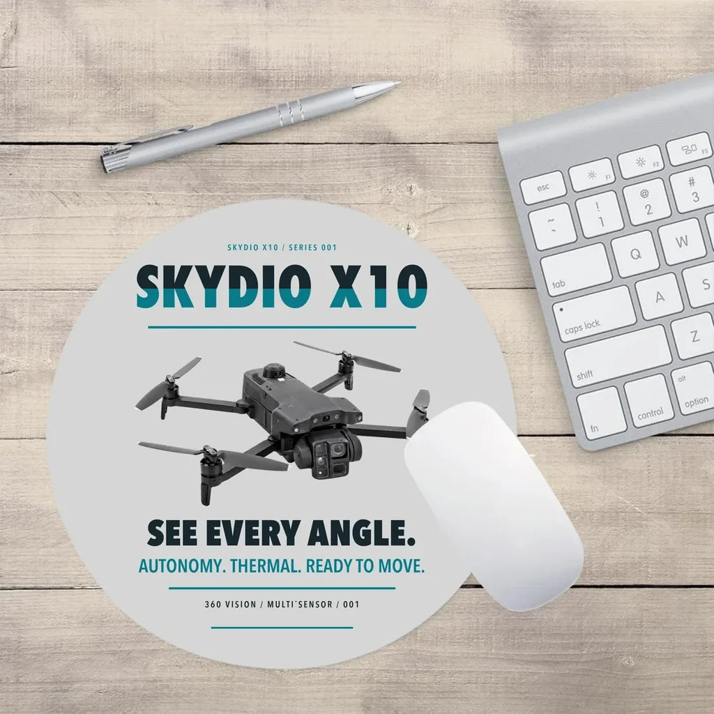 Skydio X10 design on light gray round mouse pad