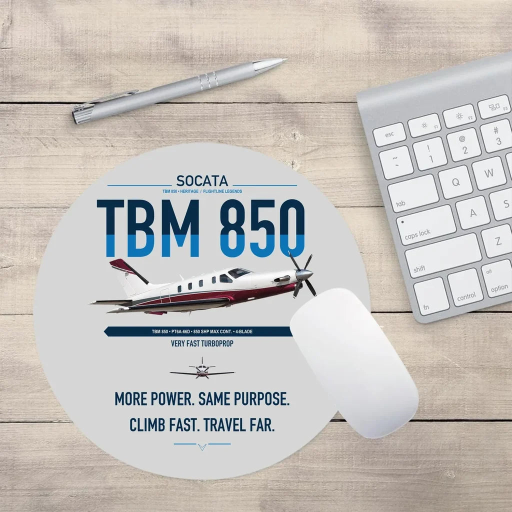 Socata TBM 850 design on light gray round mouse pad