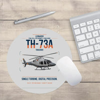 Thumbnail for Leonardo TH-73A Thrasher design on light gray round mouse pad