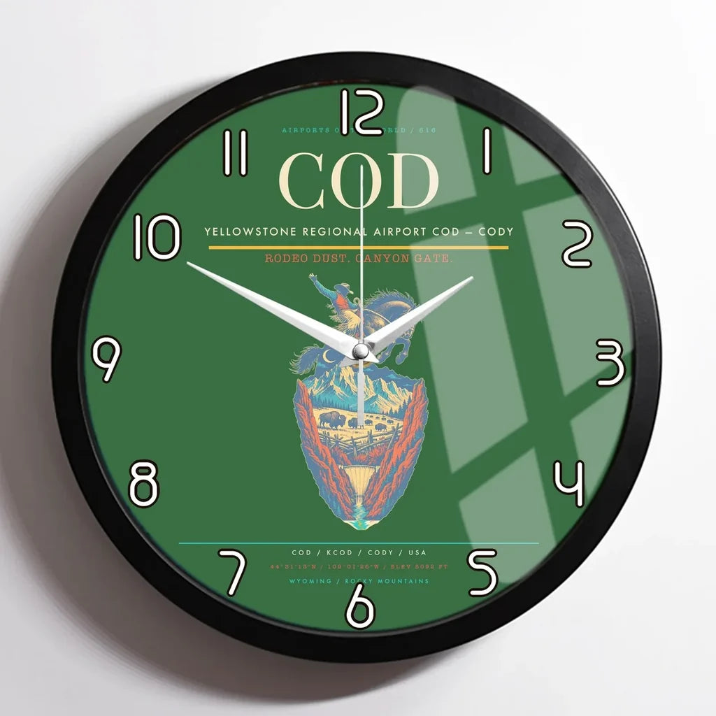 Yellowstone Regional Airport (COD) design on green framed wall clock