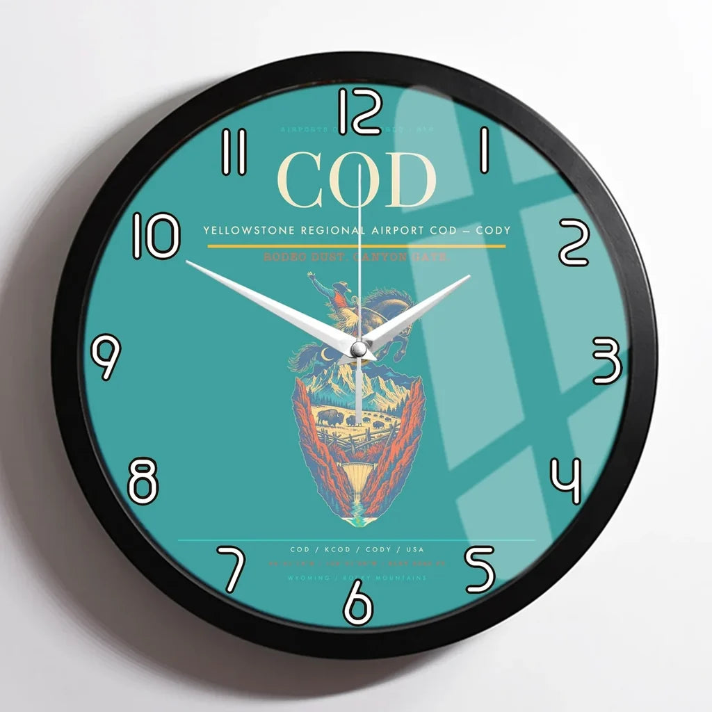 Yellowstone Regional Airport (COD) design on turquoise framed wall clock