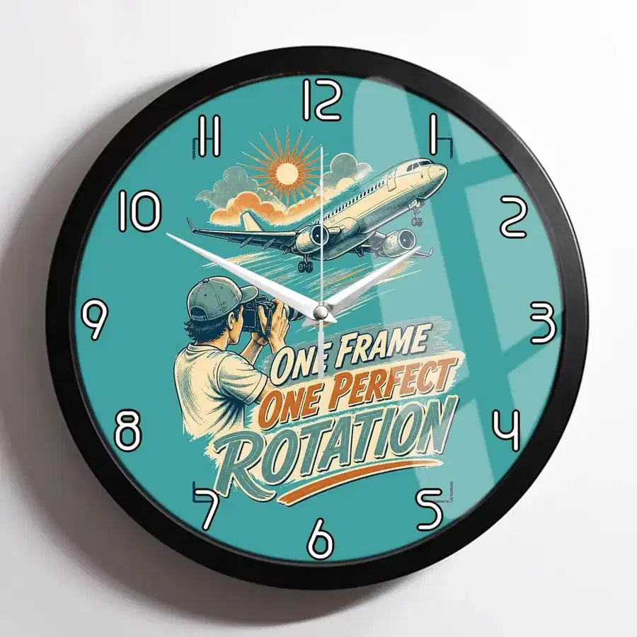 One Frame One Perfect Rotation design on turquoise framed wall clock