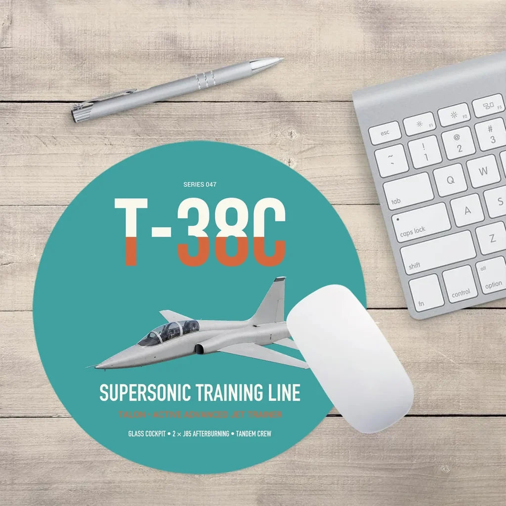 T-38C Talon design on turquoise round mouse pad