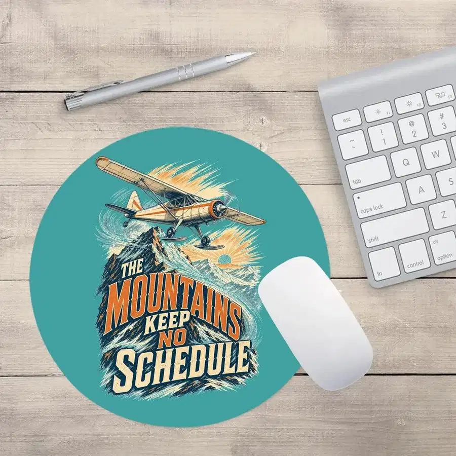 The Mountains Keep No Schedule design on turquoise round mouse pad