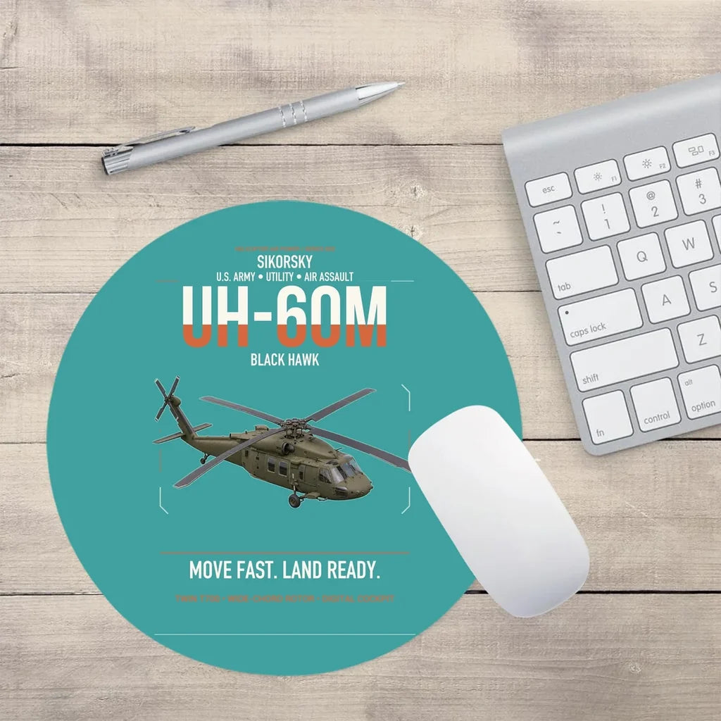 Sikorsky UH-60M Black Hawk design on turquoise round mouse pad