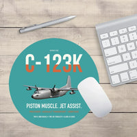 Thumbnail for C-123K Provider design on turquoise round mouse pad