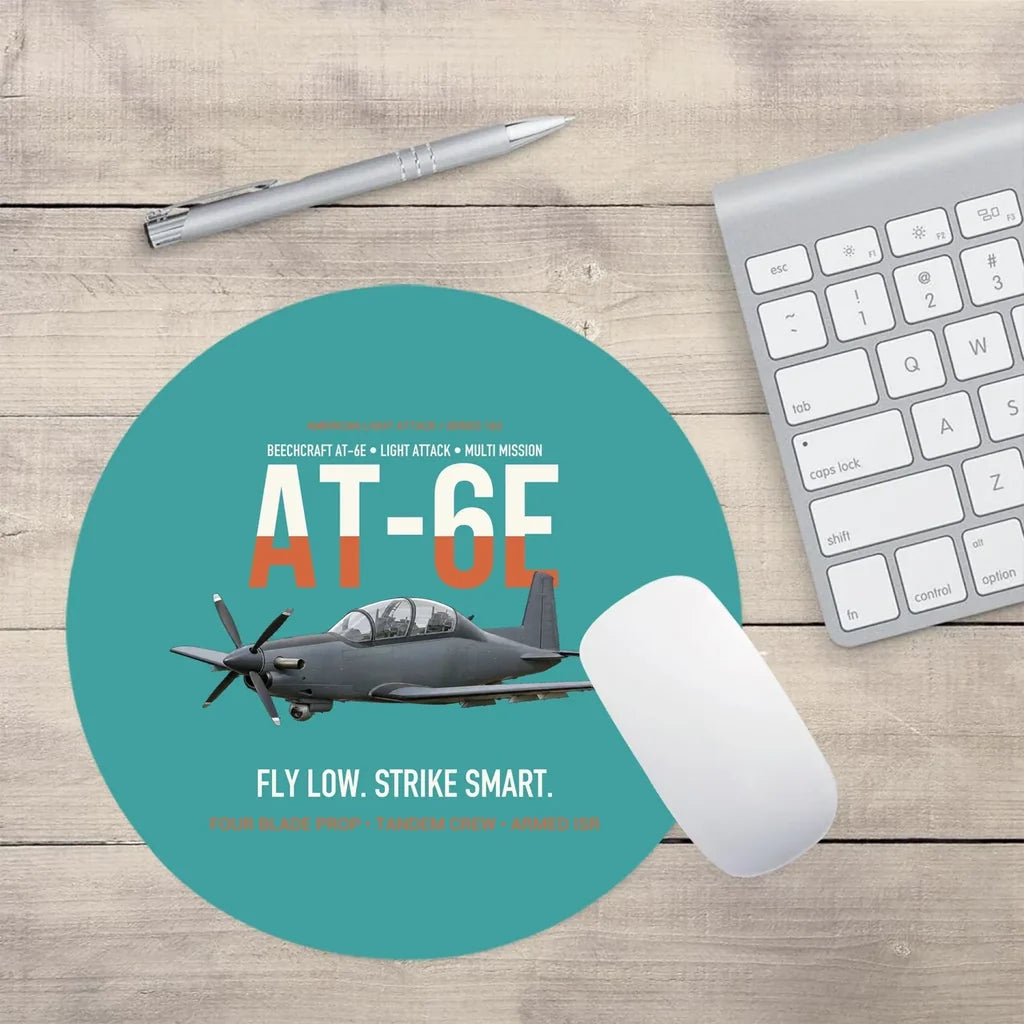 AT-6E Wolverine Light Attack design on turquoise round mouse pad
