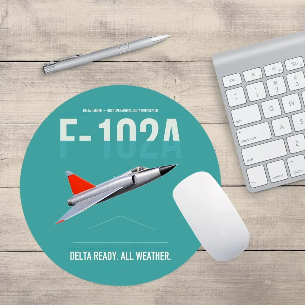 F-102A Delta Dagger design on turquoise round mouse pad