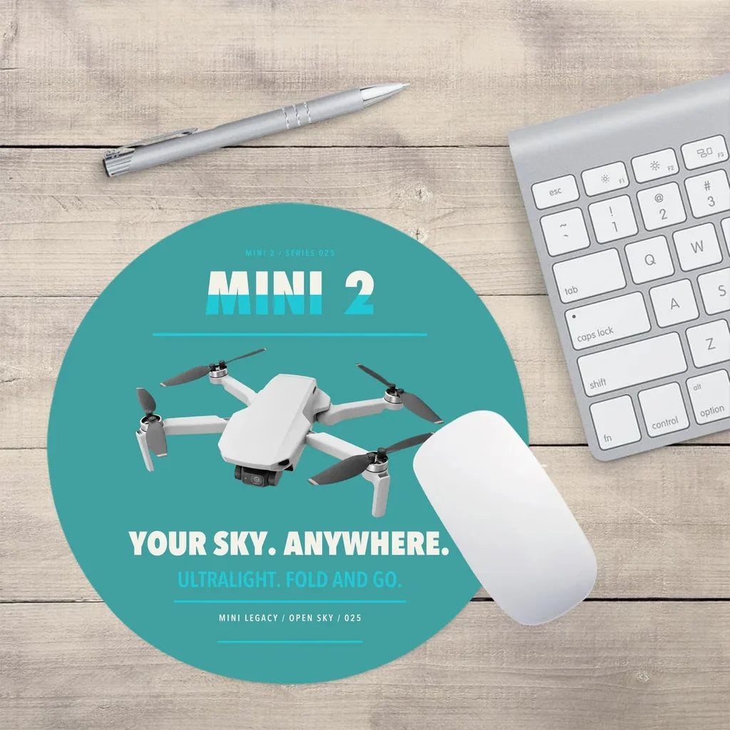 DJI Mini 2 design on turquoise round mouse pad