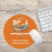 Thumbnail for Pilatus PC-6 Porter design on orange round mouse pad