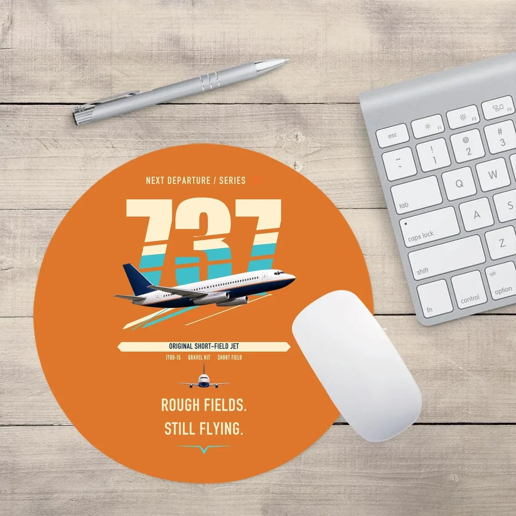 Boeing 737-200 design on orange round mouse pad