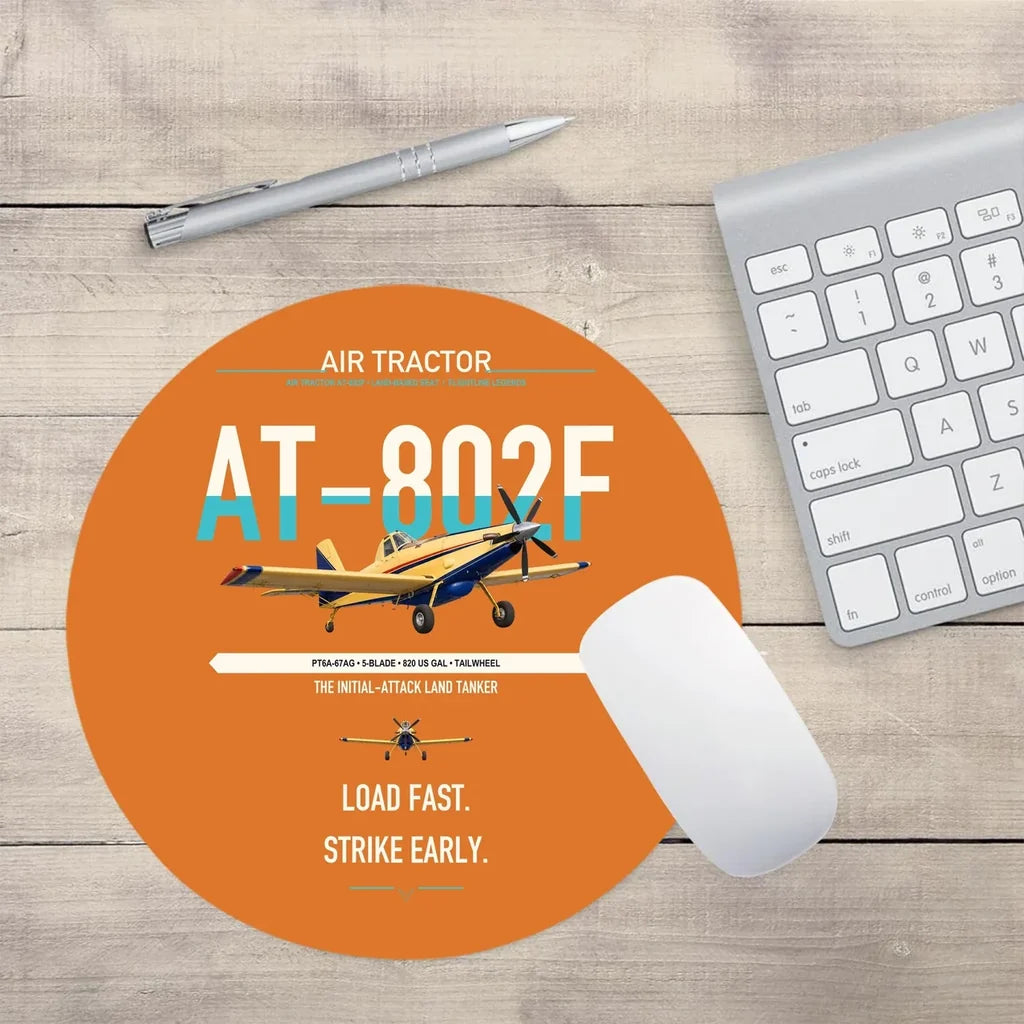Air Tractor AT-802F design on orange round mouse pad