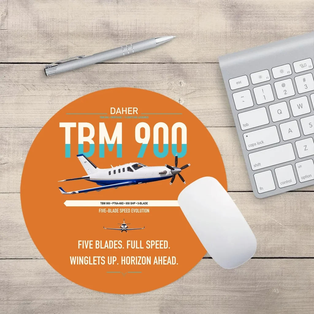 Daher TBM 900 design on orange round mouse pad